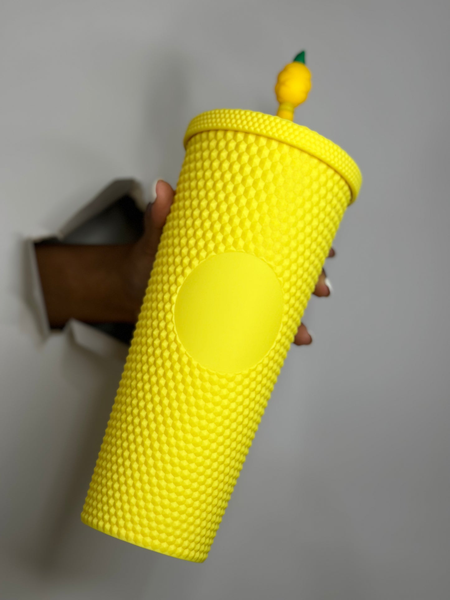 Yellow studded tumbler